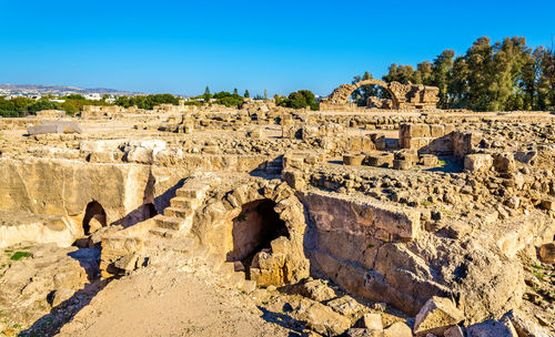 View of old ruins against blue sky