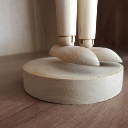 Close-up of wooden doll on table