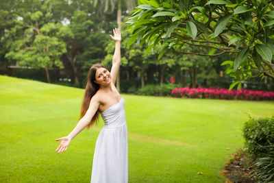 Woman standing in a park