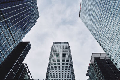 Low angle view of modern buildings against sky