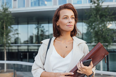 Young woman using mobile phone