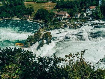 High angle view of sea by trees