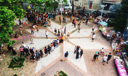 High angle view of people walking on street