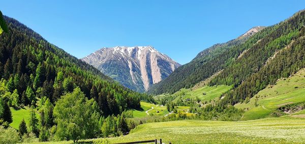 Scenic view of mountains against clear sky