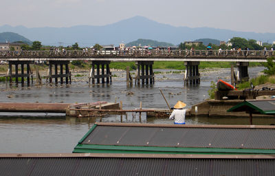 Pier over lake against sky