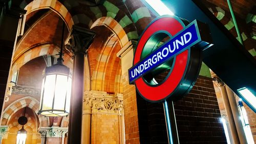 Low angle view of illuminated text on building