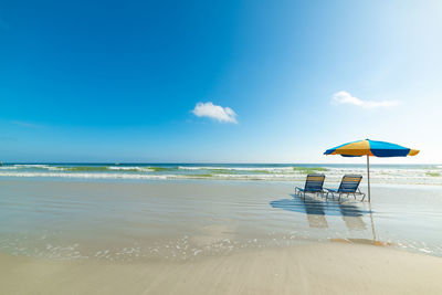 Scenic view of beach against sky