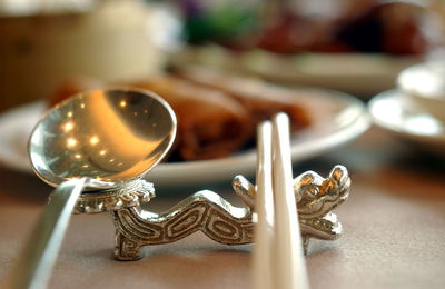 Close-up of glasses on table