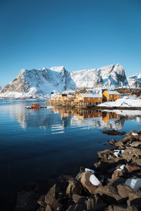 Scenic view of sea against clear blue sky