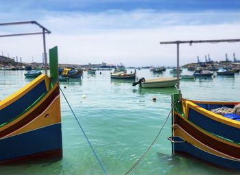 Boats moored in harbor