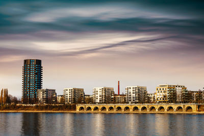 Buildings in city against sky