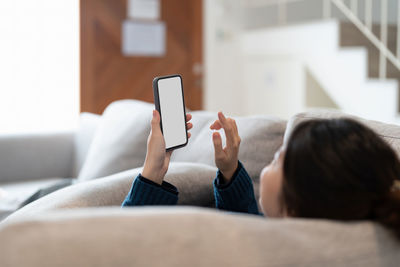 Woman using mobile phone