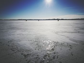 Scenic view of beach against clear sky