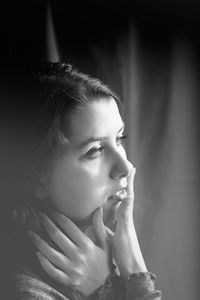 Close-up of woman looking away