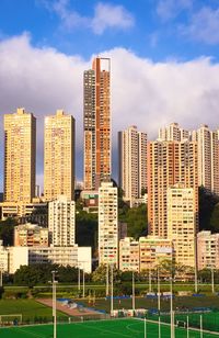 Buildings in city against sky