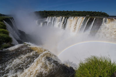 Scenic view of the devil's throat waterfall at the iguacu falls