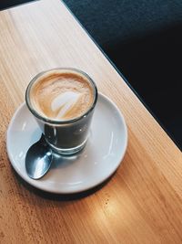 High angle view of cappuccino on table