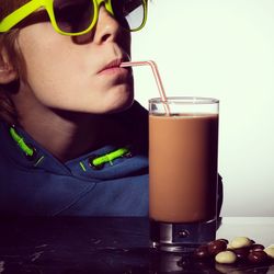 Boy drinking chocolate milkshake