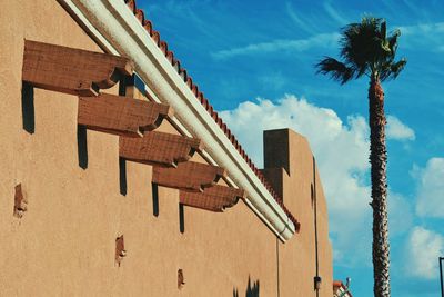 Low angle view of building against blue sky