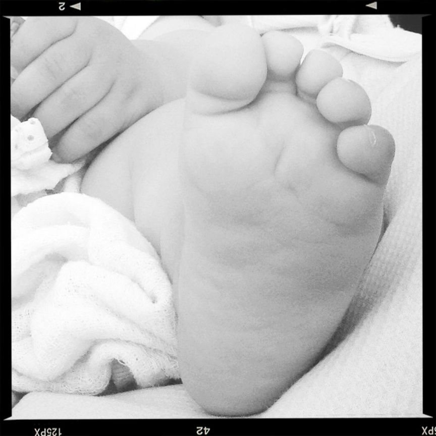 transfer print, auto post production filter, indoors, person, close-up, baby, part of, childhood, lifestyles, babyhood, unknown gender, human finger, bed, sleeping, relaxation, high angle view, cropped