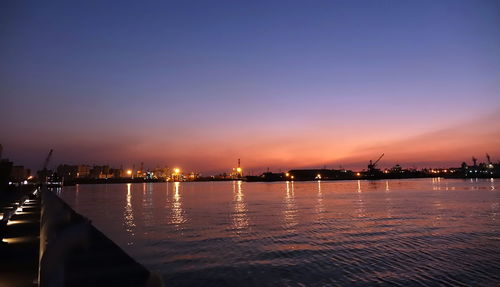 Illuminated marina at sunset