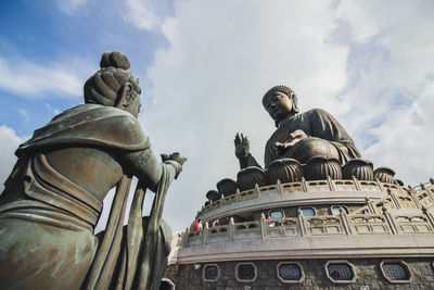 Statue of buddha against sky