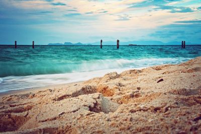 Scenic view of beach against sky