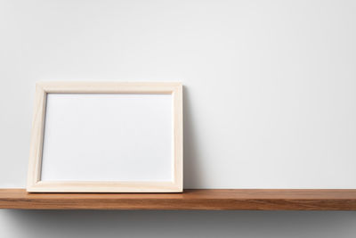 Close-up of table against white background