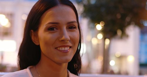 Portrait of smiling young woman