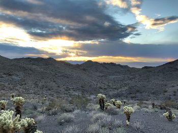 Scenic view of mountains against sky during sunset