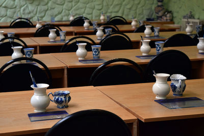 Close-up of crockery on table arranged in restaurant