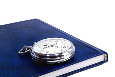 High angle view of clock on table