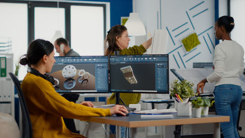 Group of people working on table