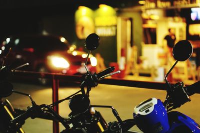 Cropped image of motorcycle on street