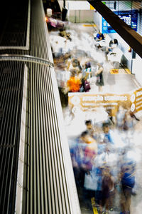 People at market stall in city