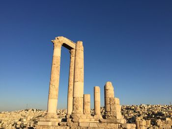 Low angle view of old ruins against sky