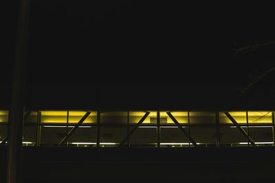 Close-up of modern building at night