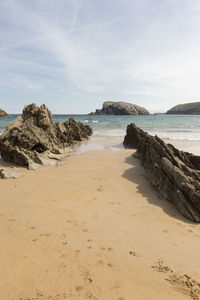 Scenic view of beach against sky