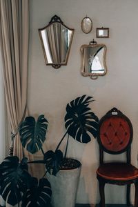 Electric lamp hanging on wall at home