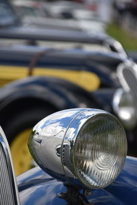 Close-up of vintage car headlight