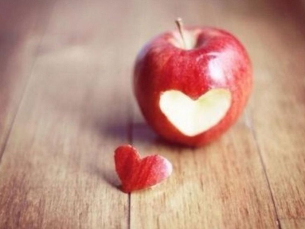 red, indoors, food and drink, table, freshness, food, wood - material, still life, healthy eating, close-up, fruit, wooden, heart shape, selective focus, no people, high angle view, focus on foreground, wood, apple - fruit, strawberry