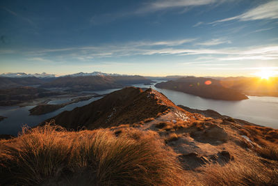 Scenic view of mountains against sky during sunset