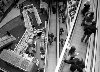 High angle view of people walking on subway station