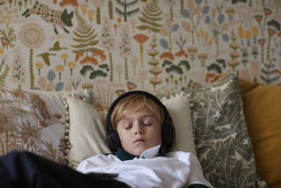 Boy lying in bed