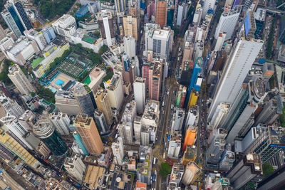 High angle view of crowd and buildings in city