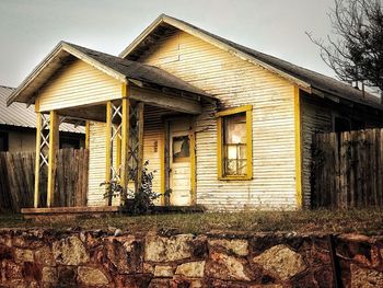 Abandoned house against sky