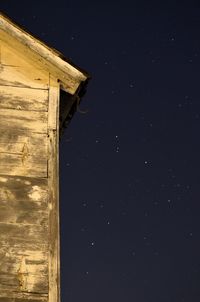 Low angle view of built structure against sky at night