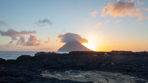 Scenic view of sea against sky during sunset