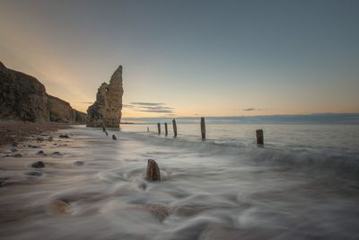 Scenic view of sea against sky during sunset