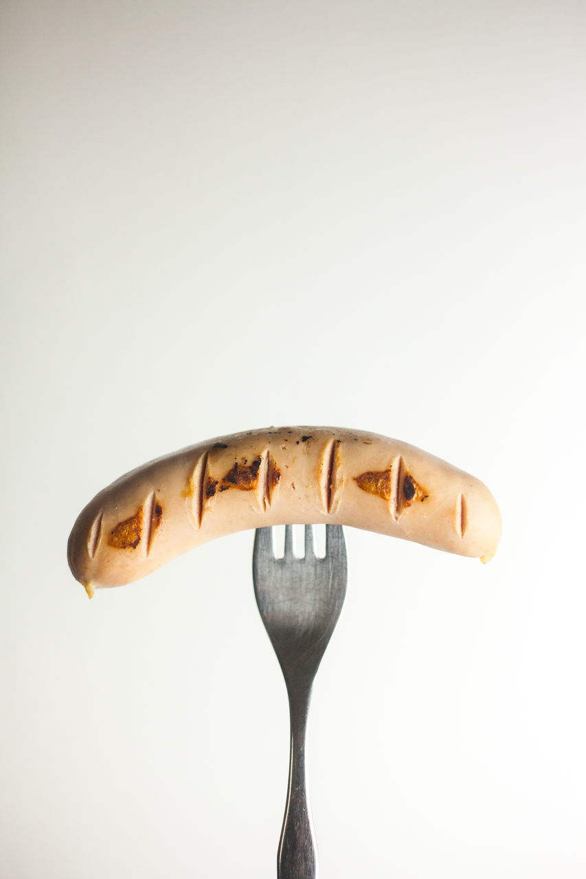 CLOSE-UP OF PASTRIES OVER WHITE BACKGROUND